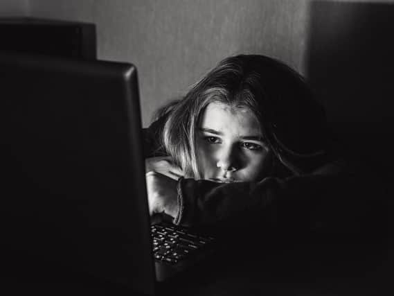 Today a supervisor at Leeds Childline centre warns that the lives of thousands of young people in our region are being devastated by online abuse. Picture posed by model. Picture: Shutterstock