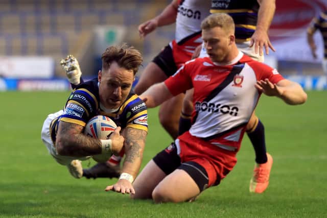 Leeds Rhinos' hopes of building on the momentum from their win over Salford, avbove, have been scuppered. Picture: Mike Egerton/PA.