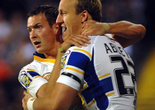 Leeds Rhinos' Carl Ablett (right) celebrates his try against Hull FC with Danny McGuire in 2007. Picture: Anna Gowthorpe/PA Wire.