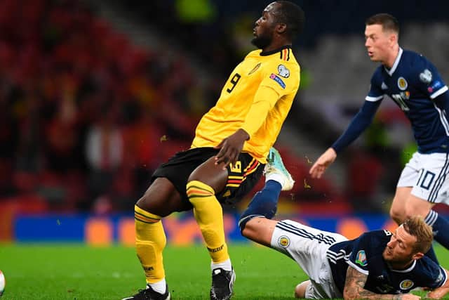 WAITING IN THE WINGS: Leeds United captain Liam Cooper, centre, could be handed a third cap for Scotland against the Czech Republic on Monday night. Photo by ANDY BUCHANAN/AFP via Getty Images.