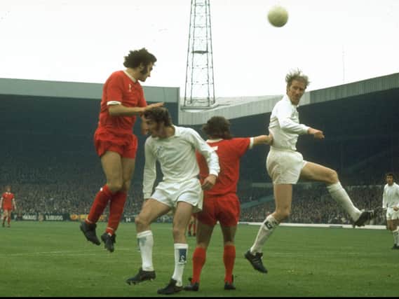 RIVALS - Larry Lloyd, left and Kevin Keegan of Liverpool compete with Jack Charlton, right and Paul Madeley of Leeds United at Anfield. Pic: Getty