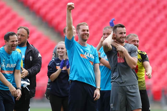 MAGIC MOMENT: Harrogate Town boss Simon Weaver celebrates his team's victory over Notts County at Wembley. Picture: Catherine Ivill/Getty Images