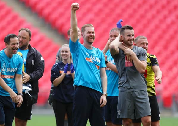 MAGIC MOMENT: Harrogate Town boss Simon Weaver celebrates his team's victory over Notts County at Wembley. Picture: Catherine Ivill/Getty Images