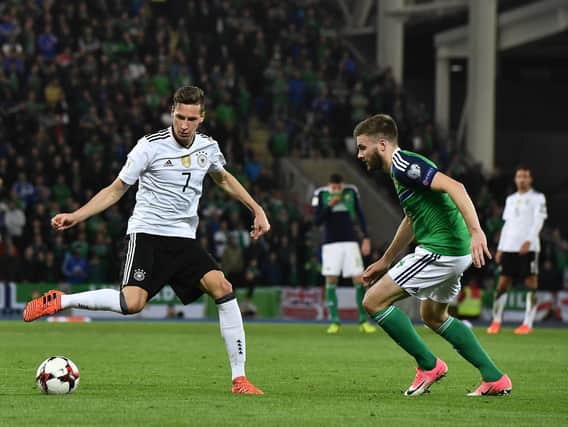 TOP OPPOSITION - Leeds United's Stuart Dallas in Northern Ireland action against Julian Draxler of Germany. Pic: Getty