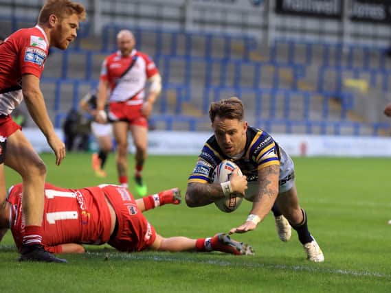 Richie Myler scores against Salford. Picture by Mike Egerton PA Wire.