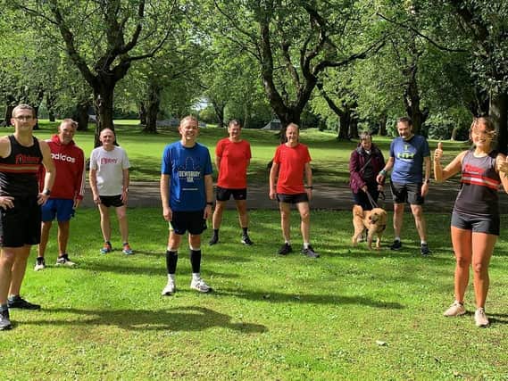 Matt Ellis (fourth from left) ran all nine Leeds parkruns in one day to raise cash for charity Simon on the Streets.