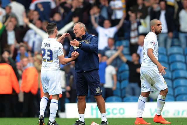 WELL PLAYED LAD: Boss Neil Redfearn with Lewis Cook after his full league debut against Bolton in August 2014. Picture by Jonathan Gawthorpe.