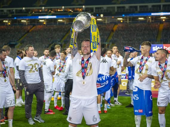 Leeds United captain Liam Cooper lifts the Championship trophy. (Tony Johnson)