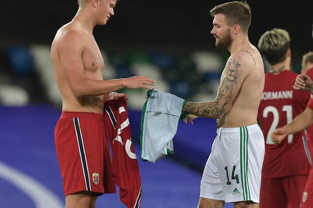 Stuart Dallas swaps shirt with Erling Haaland following their Nations League meeting. (Getty)