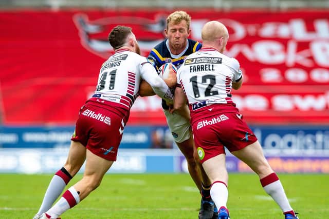 Matt Prior is tackled during Leeds' defeat by Wigan. Picture by Bruce Rollinson.