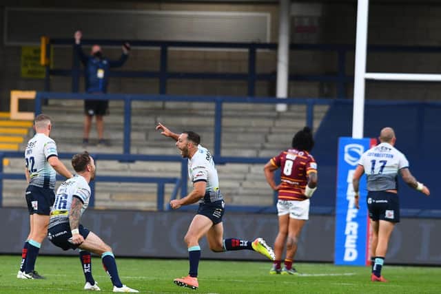 Luke Gale celebrates his winning drop goal against Huddersfield last month. Picture by James Hardisty.