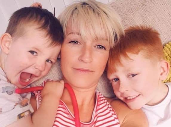 Emma Hoult, 35, pictured with sons Harry and Jack