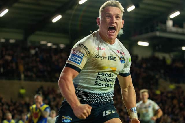 Brad Dwyer celebrates after scoring the third try against Warrington earlier this year.