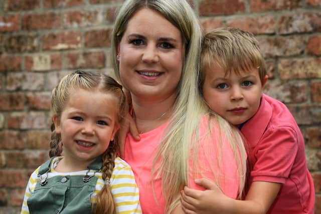 Jess Cooper, with children Archie, seven, and Emilia, three Picture: Jonathan Gawthorpe