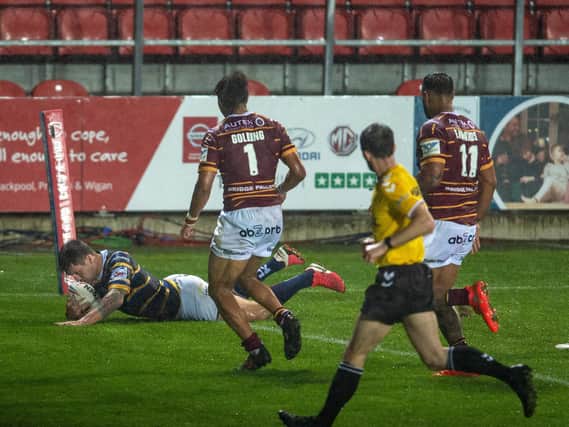 Tom Briscoe scores Rhinos' second try in their comeback win over Giants. Picture by Bruce Rollinson