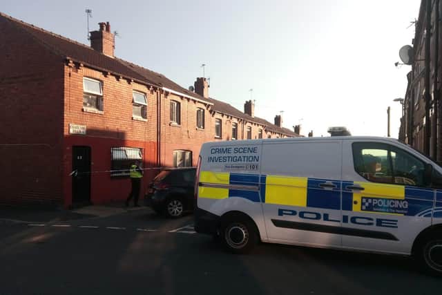 Police at the scene of the shooting in East End Park, Leeds. Photos: Emma Ryan