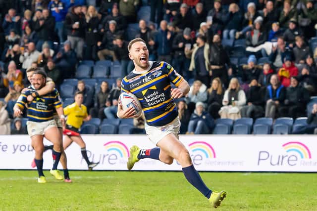 TOO LONG: Leeds Rhinos' Luke Gale scores a try against Toronto Wolfpack at HEadingley on March 5 - the last time the Rhinos played in front of their own fans. Picture by Allan McKenzie/SWpix.com.