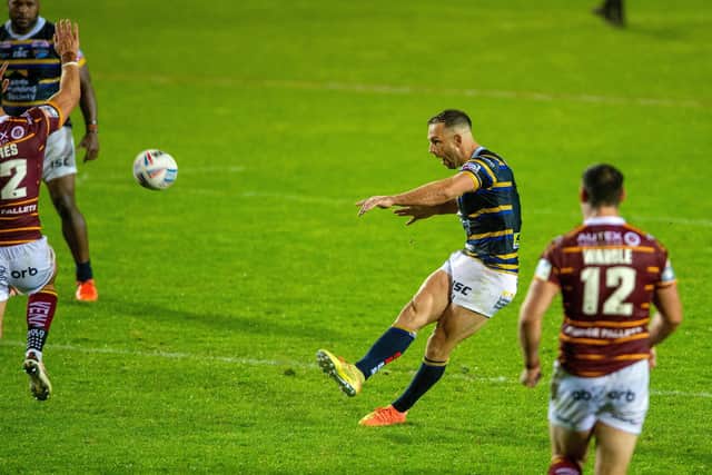 KEY MOMENT: Luke Gale kicks the drop goal that ultimately sank Huddersfield Giants on Friday night at the Totally Wicked Stadium. Picture: Bruce Rollinson.