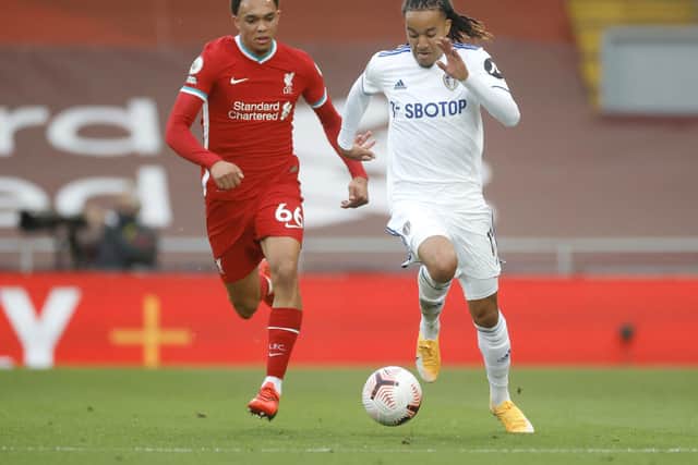 LIVELY: Leeds United winger Helder Costa, right, races away from Liverpool's young England international Trent Alexander-Arnold in Saturday's seven-goal thriller at Anfield. Photo by Phil Noble - Pool/Getty Images.