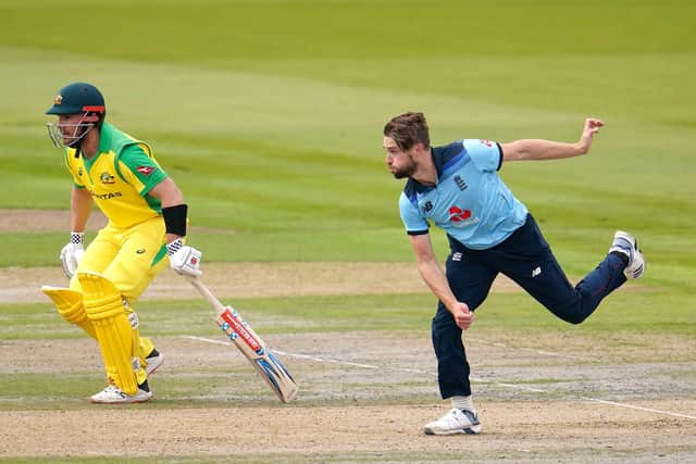 England's Chris Woakes bowls as Australian captain Aaron Finch looks on at Emirates Old Trafford. Picture: Jon Super/NMC Pool/PA