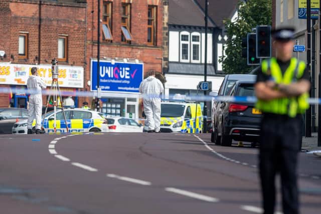 Police at the scene of the attempted murder in North Lane, Headingley (photo: James Hardisty).