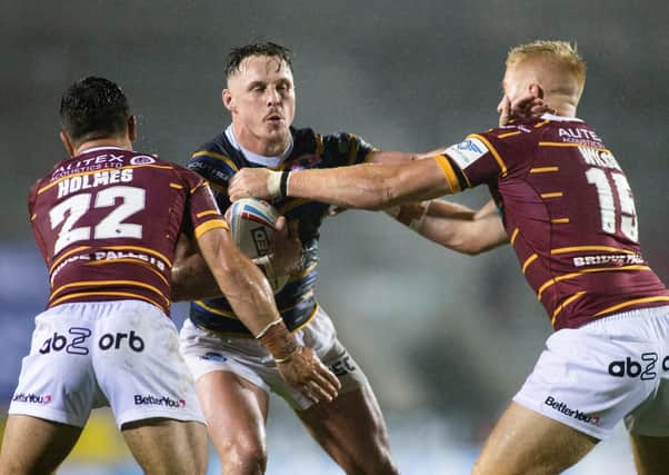 Leeds Rhinos' James Donaldson fronts up against the Huddersfield Giants' defence. Picture: Isabel Pearce/SWpix.com.