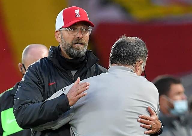 Liverpool manager Jurgen Klopp (left) and Leeds United manager Marcelo Bielsa embrace after the Premier League match at Anfield.
Picture: Paul Ellis/NMC Pool/PA Wire.