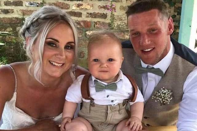 Arlo as a baby pictured with his parents - Jodie, 33, and Paul, 35