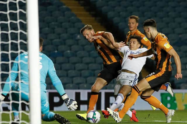 TAKING IT TO THE TIGERS: Leeds United's Ian Poveda strides on with Hull City duo Callum Elder and Alfie Jones both needed to stop him his tracks. .Photo by Phil Noble - Pool/Getty Images.