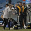 CHANGES: Eleven made by Leeds United head coach Marcelo Bielsa, left, and six by Hull City boss Grant McCann, right, as the duo interact before Wednesday's Carabao Cup tie at Elland Road. Photo by Phil Noble - Pool/Getty Images.