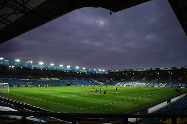 STILL EMPTY: Leeds United's midweek Carabao Cup clash against Hull City, above, was the latest Elland Road contest to be staged in front of stands without supporters. Photo by OLI SCARFF/POOL/AFP via Getty Images.