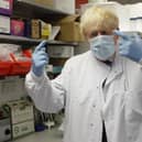 Prime Minister Boris Johnson gestures during a visit to the Jenner Institute in Oxford, where toured the laboratory and met scientists who are leading the COVID vaccine research. Photo: PA