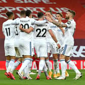 BRIGHT FORECAST: For Leeds United after their opening weekend display at Liverpool with the Whites pictured celebrating Mateusz's Klich's strike. Photo by Paul Ellis - Pool/Getty Images.