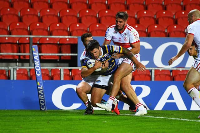 Tight squeeze: Winger Tom Briscoe managed to score the third try of the game.

Picture: Jonathan Gawthorpe