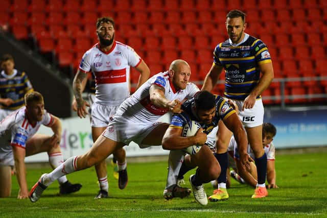 Rhyse Martin scores Rhinos' eighth and final try in the 48-18 Cup thrashing of Hull KR. Picture by Jonathan Gawthorpe.