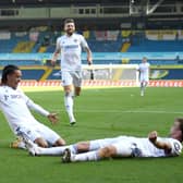 EXCELLING: Leeds United winger Helder Costa, left, celebrates his second goal of the game with assist provider Patrick Bamford as Stuart Dallas closes in. Photo by Oli Scarff - Pool/Getty Images.