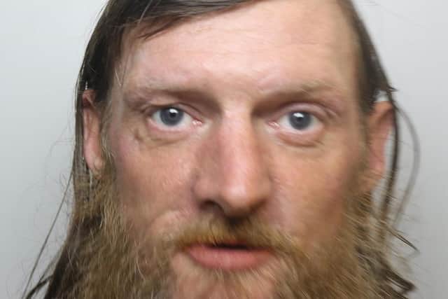 Colin Halliday was jailed for two years for robbing a 19-year-old woman at a post office in Leeds city centre