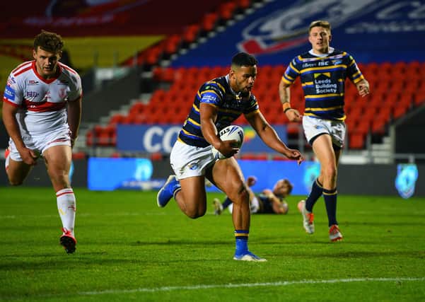 Hooker Kruise Leeming crosses for his second try in Leeds Rhinos' Challenge Cup quarter-final victory over Hull KR. Picture: Jonathan Gawthorpe/JPIMedia.