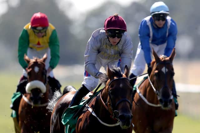 Aljady ridden by Paul Hanagan (centre) after winning The Follow @Racing_UK On Twitter Handicap Stakes back in 2018. Picture: Simon Cooper/PA Wire.