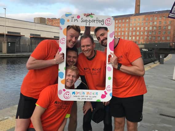 The fundraising runners pictured at the start of their 30-mile challenge at Manchester's Cotton Field Wharf. Clockwise from bottom left Rob Mynett, Joe Metcalfe, Sam Beresford, Jack Firth, Joe Butcher