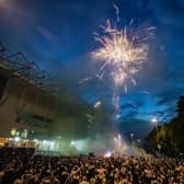 Leeds United fans celebrate the team's promotion to the Premier League