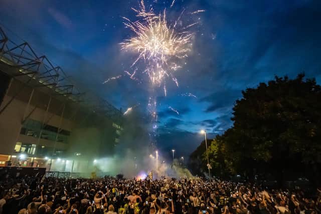 Leeds United fans celebrate the team's promotion to the Premier League