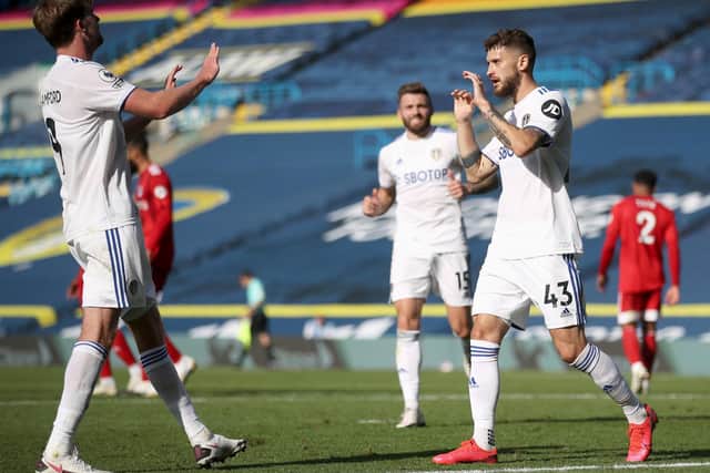 THRIVING: Leeds United midfielder Mateusz Klich, right, celebrates doubling his tally for the season already in Saturday's 4-3 victory at home to Fulham. Photo by Carl Recine - Pool/Getty Images.