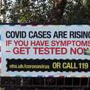 A public information sign warning of rising Covid-19 cases in London after Prime Minister Boris Johnson announced a range of new restrictions to combat the the coronavirus outbreak in England. Photo: PA