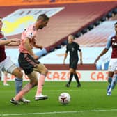 SPOT OF BOTHER: Sheffield United defender Chris Basham is caught by Aston Villa's Matt Targett for a penalty which the Blades then missed. Photo by Julian Finney/Getty Images.