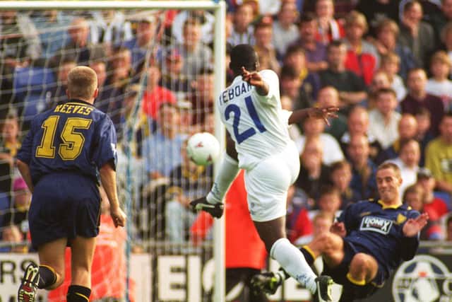 UNSTOPPABLE: Leeds United striker Tony Yeboah rifles home his stunning volley in the 4-2 victory at Wimbledon 25 years ago today. Picture by James Hardisty.