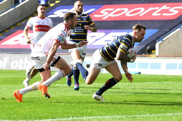 Richie Myler lunges for the line for Rhinos' fourth try of the afternoon. Picture: Jonathan Gawthorpe/JPIMedia.