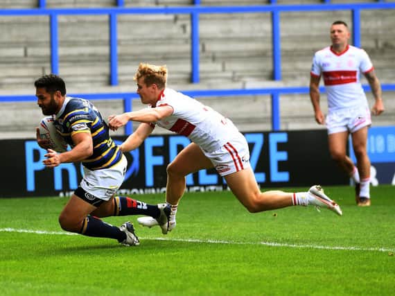 Rhyse Martin scord Rhinos' opening try. Picture by Jonathan Gawthorpe.