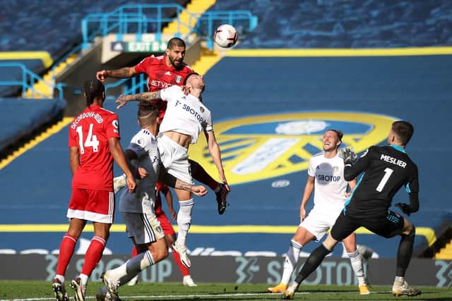DEFENSIVE TROUBLES: Striker Aleksandar Mitrovic rises highest to put Fulham back within a goal in last weekend's 4-3 thriller against Leeds United at Elland Road. Photo by Carl Recine - Pool/Getty Images.