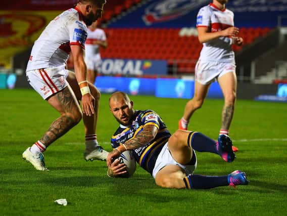 Luke Briscoe scores in Rhinos' Challenge Cup win over Hull KR. Picture by Jonathan Gawthorpe.